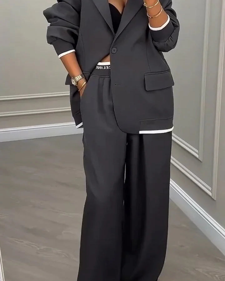 Completo donna: giacca con colletto e pantaloni da lavoro