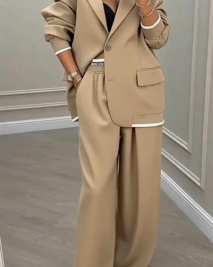 Completo donna: giacca con colletto e pantaloni da lavoro