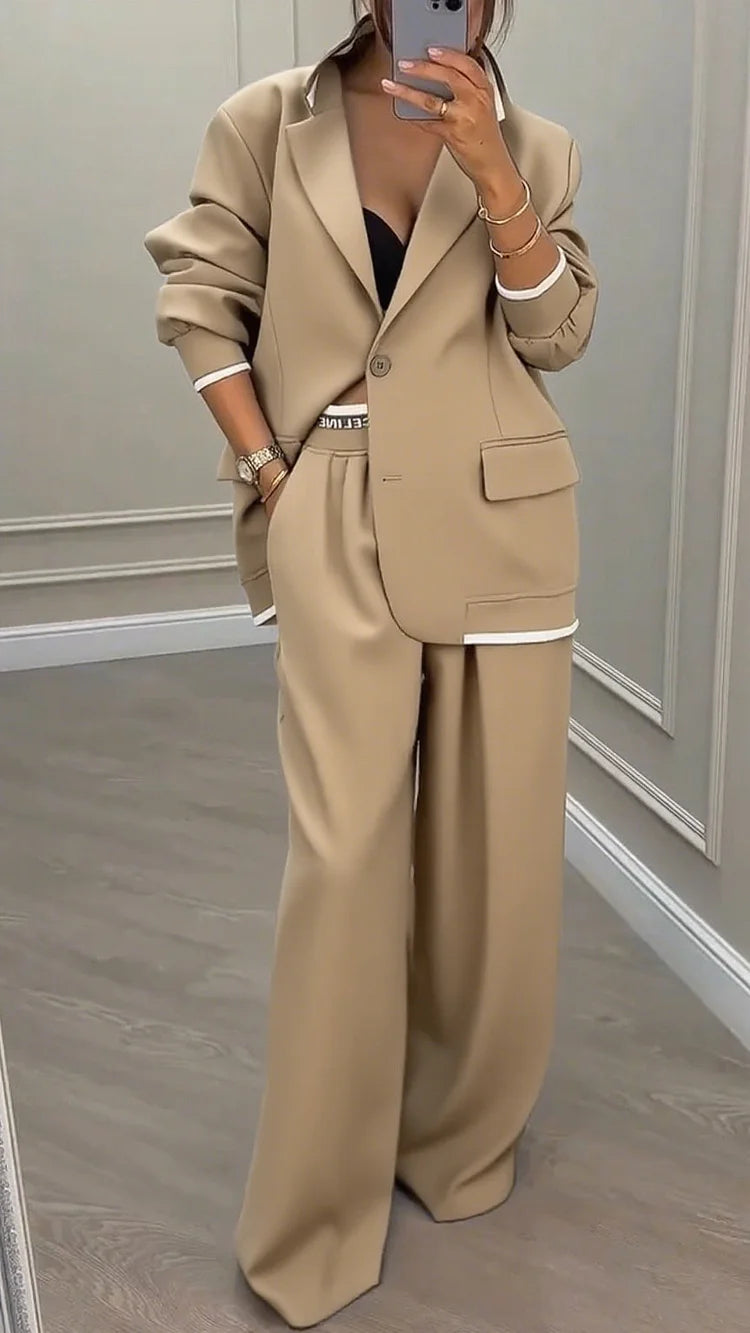 Completo donna: giacca con colletto e pantaloni da lavoro