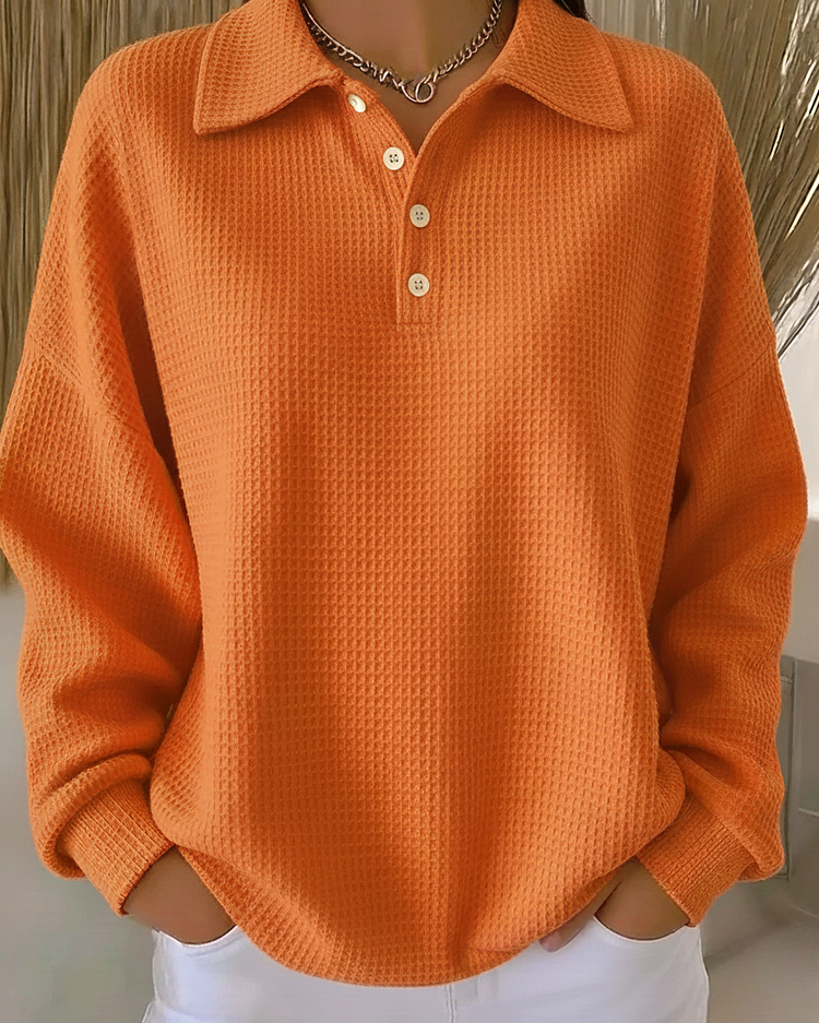 Felpa da donna casual con collo polo, bottoni e tessuto a nido d’ape