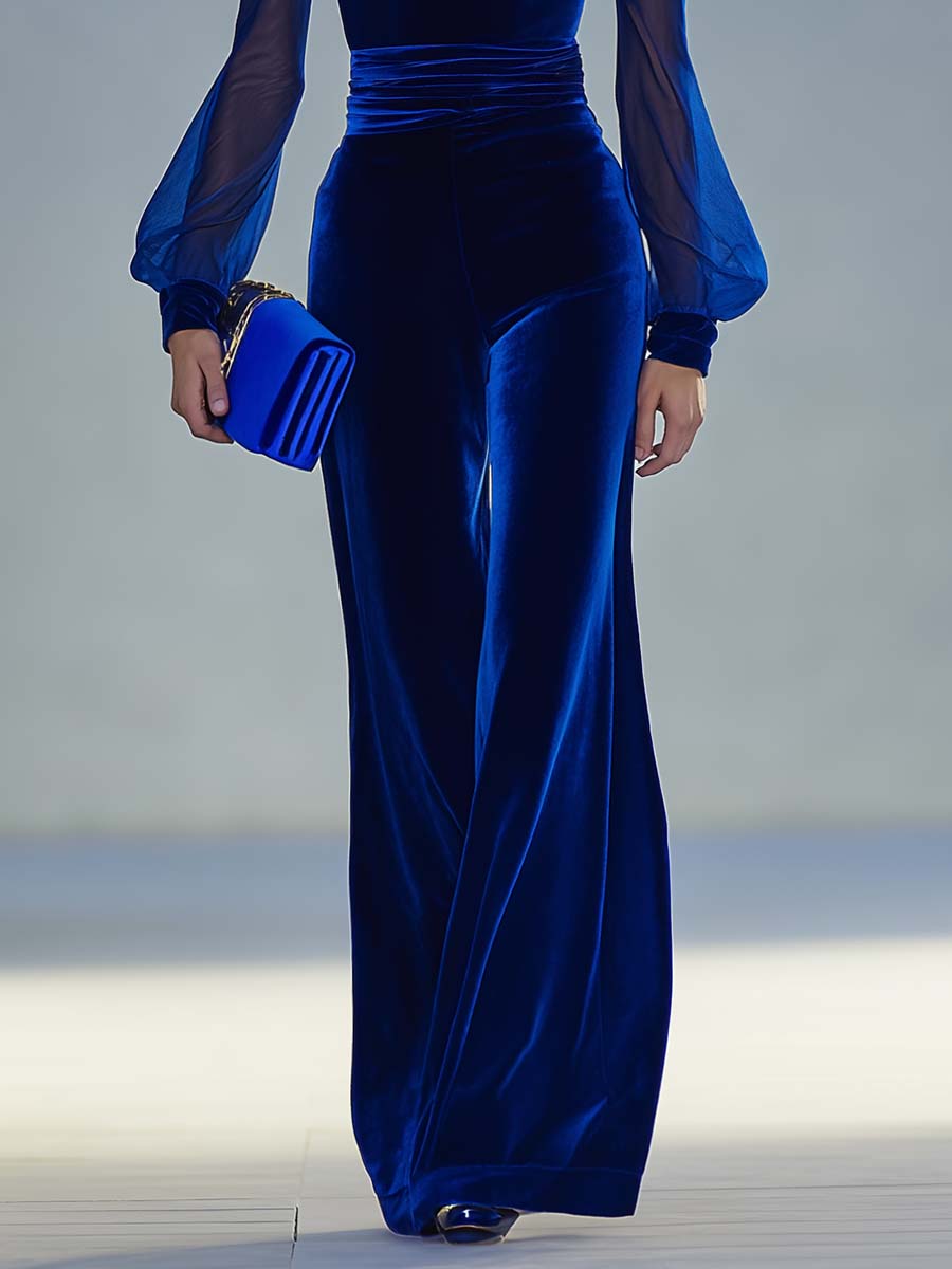 Tuta Elegante in Velluto Blu Re con Scollo a V e Dettagli in Mesh